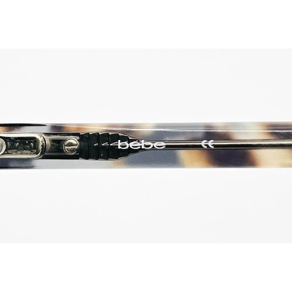 Bebe Eyeglasses Womens Black Semi-Rimless Tough Cookie BB5127 52-16-135